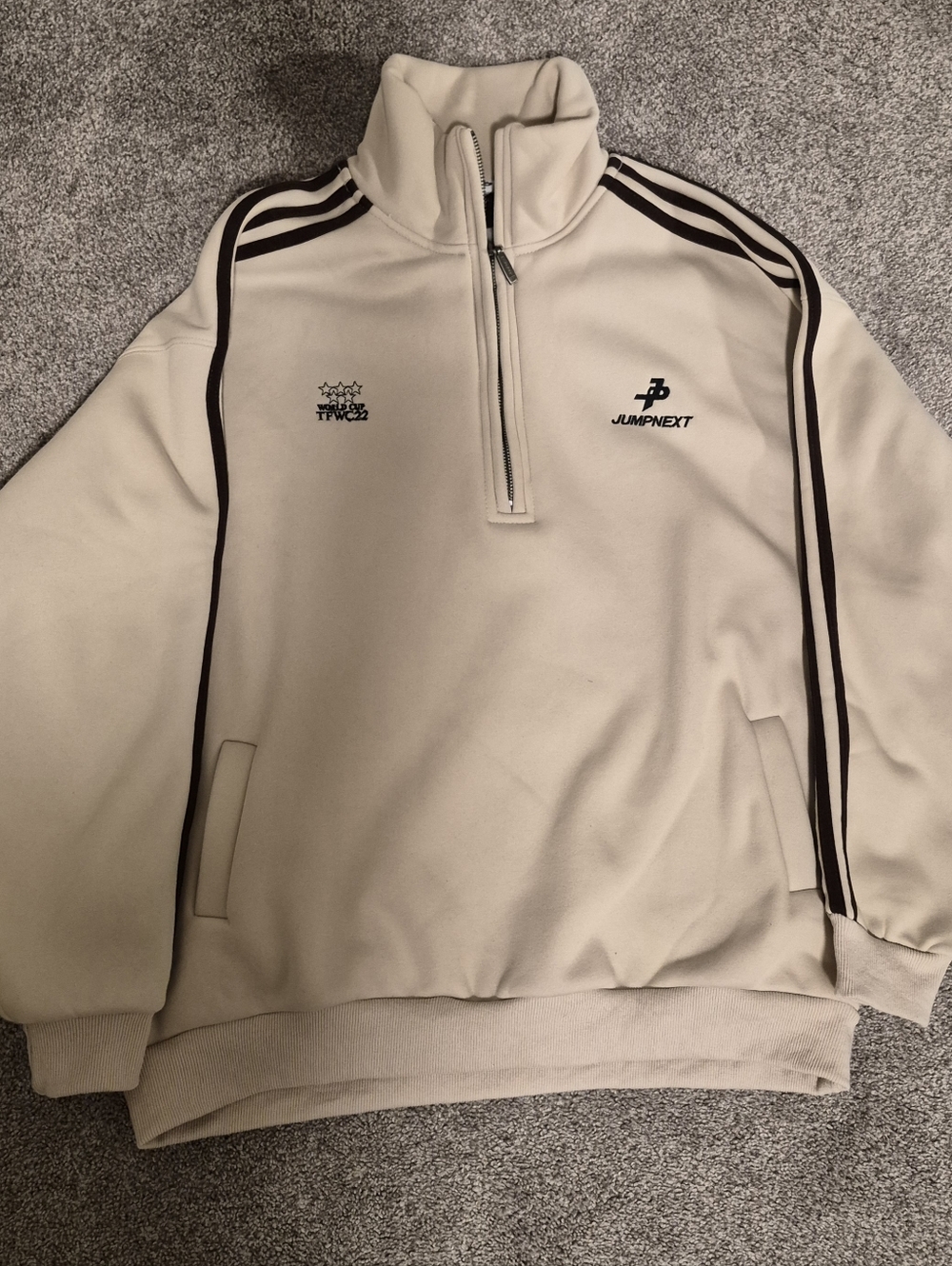 JumpNext Cream World Cup Quarter-Zip Pullover with Brown Stripe Detail
